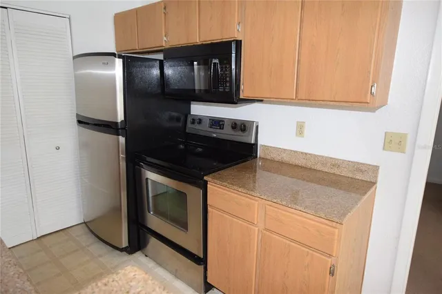 a close up of a wall with a shower