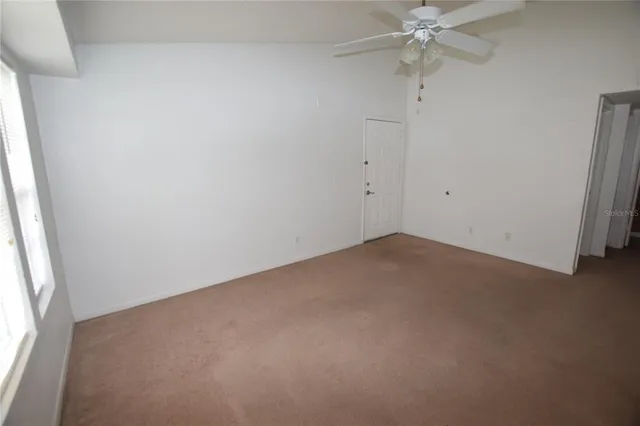 a view of a kitchen with a sink cabinets and window