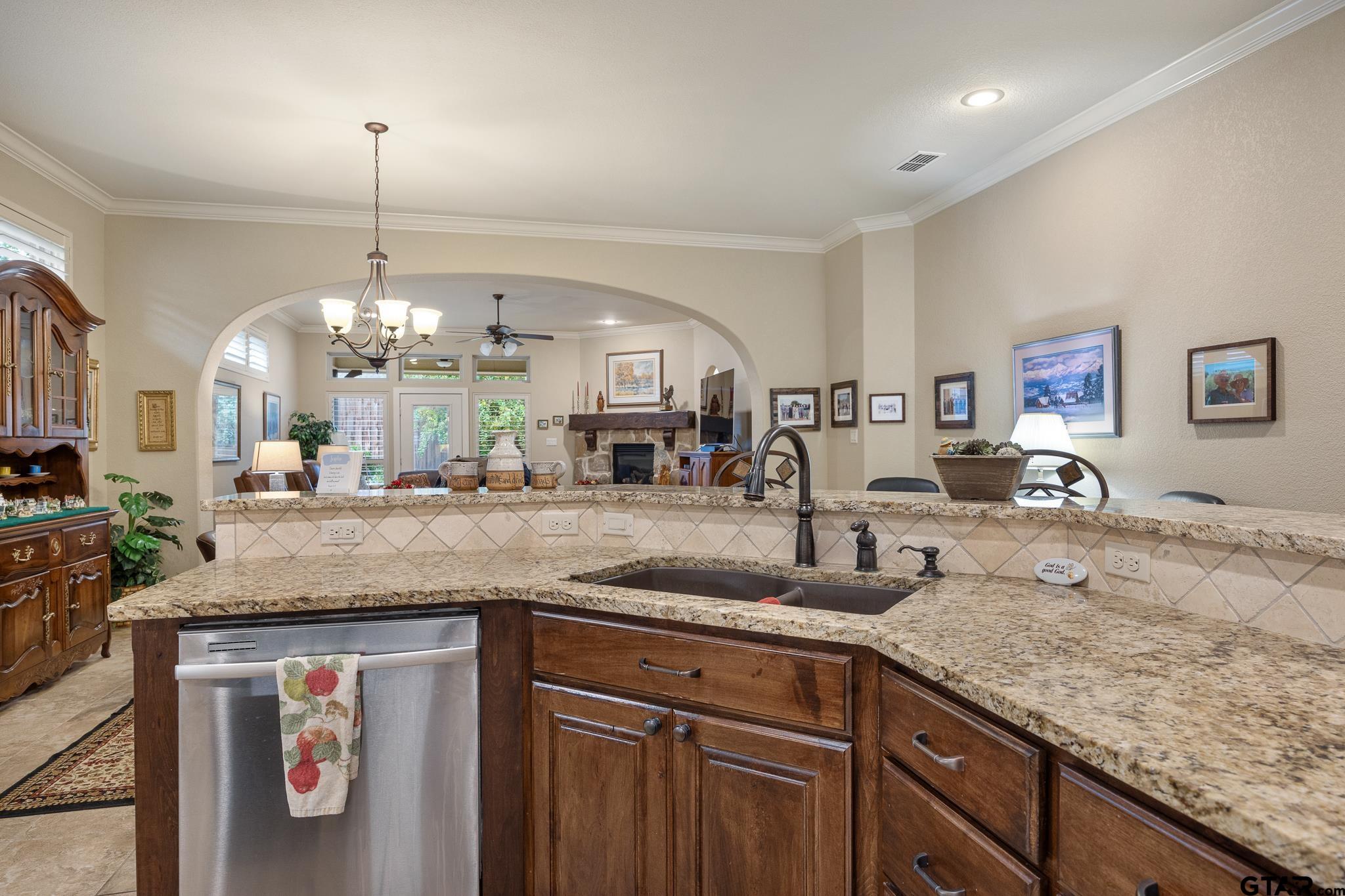 4322 Madera Drive Tyler, TX 75707 - Photo 7 of 32 a kitchen with sink and cabinets