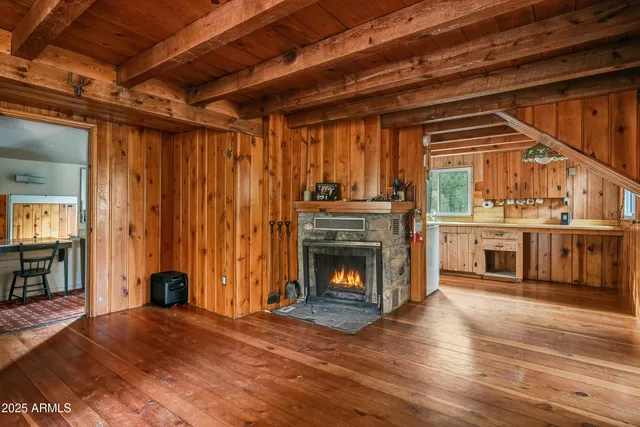 a kitchen with a stove a sink and a refrigerator