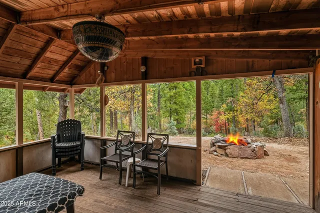 a view of a dining room with furniture water view and mountain view
