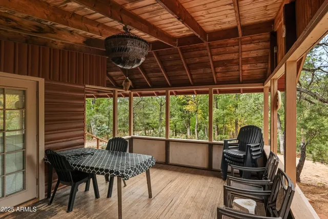 a view of a living room and outdoor space