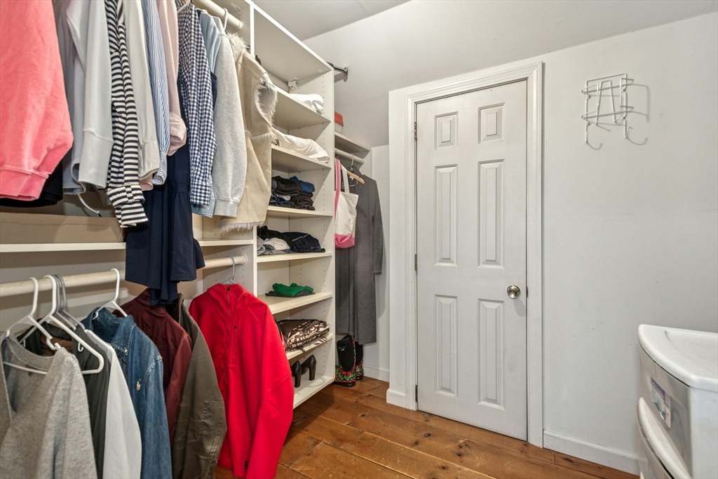 58 South Mill Street Hopkinton, MA 01748 - Photo 17 of 34 a view of walk in closet with clothes and shoes