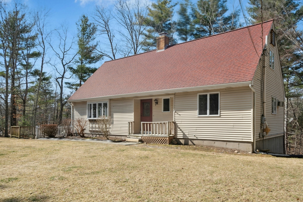 58 South Mill Street Hopkinton, MA 01748 - Photo 2 of 34 a front view of a house with a yard