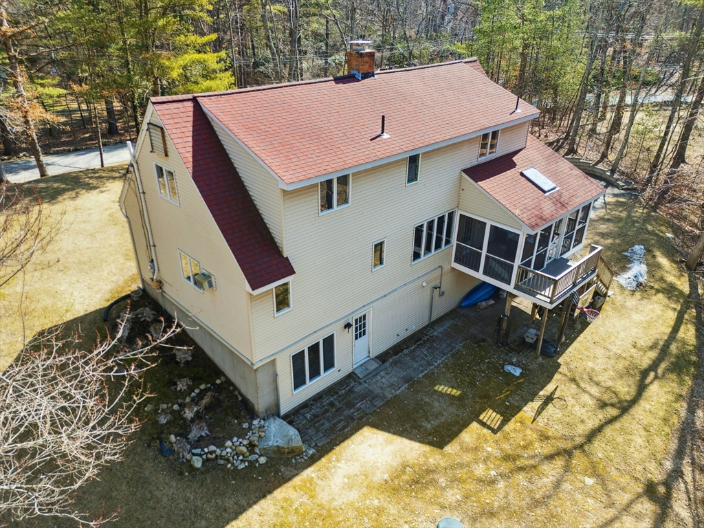 58 South Mill Street Hopkinton, MA 01748 - Photo 28 of 34 a aerial view of a house with a yard