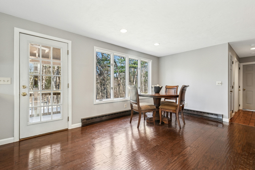 58 South Mill Street Hopkinton, MA 01748 - Photo 8 of 34 a dining room with furniture and wooden floor