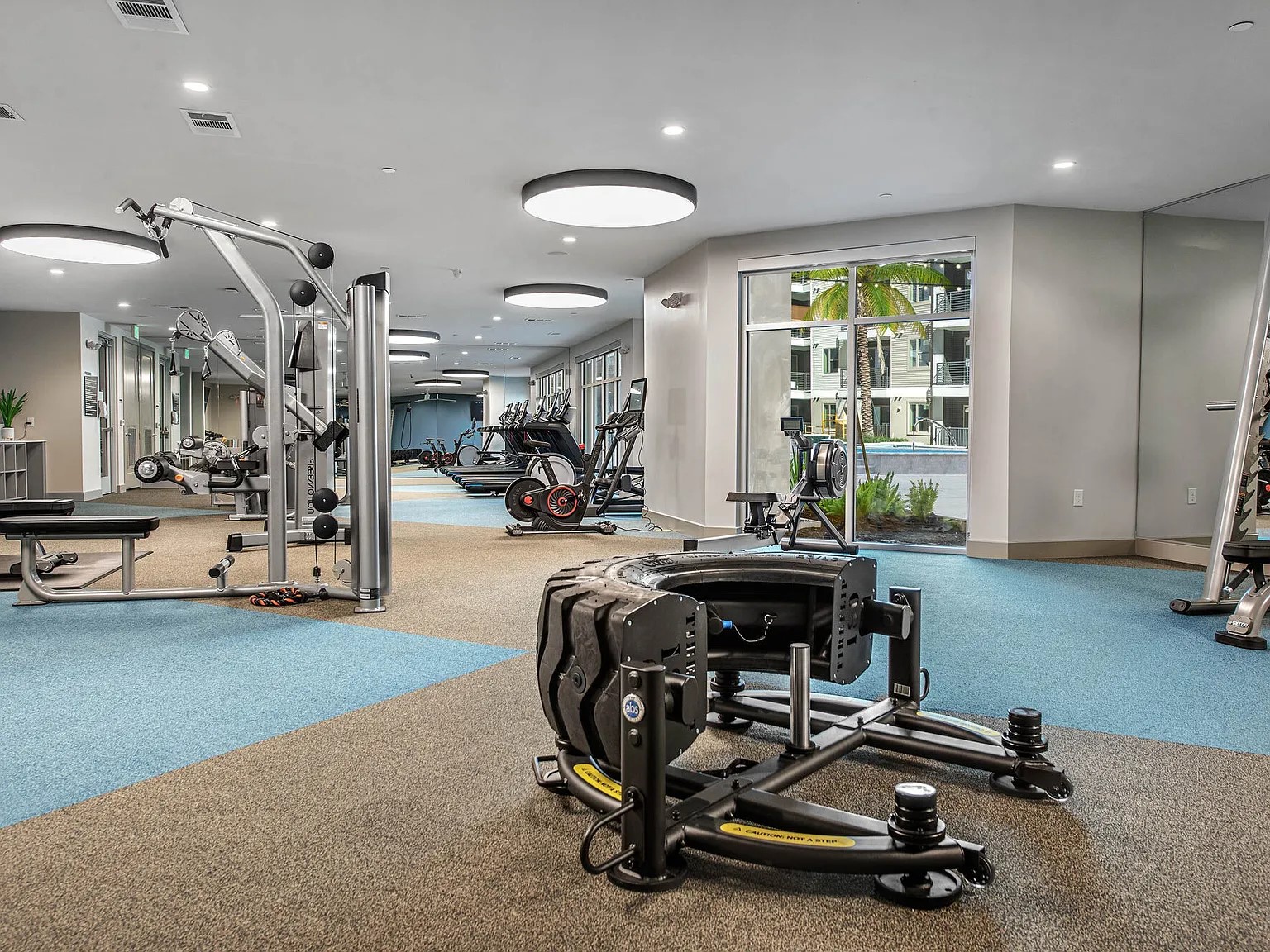 3636 West Dallas Street, Unit 359 Houston, TX 77019 - Photo 32 of 50 a view of a room with gym equipment