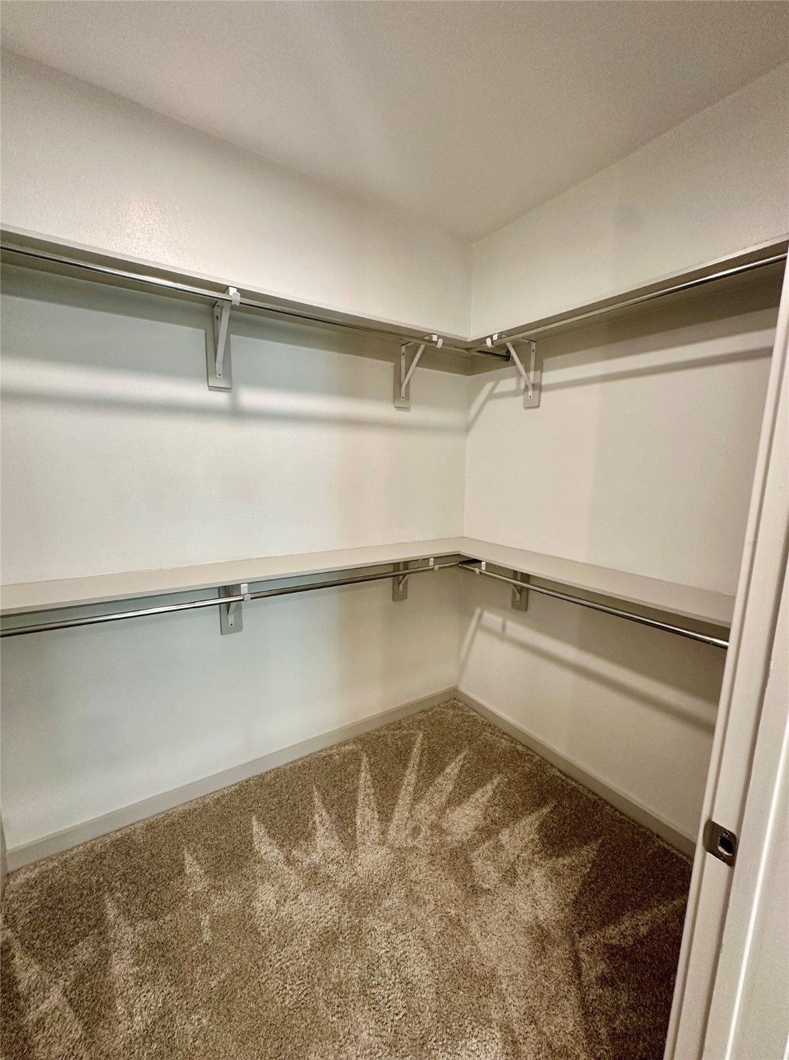 3636 West Dallas Street, Unit 359 Houston, TX 77019 - Photo 8 of 50 a view of a room with rack on the wall