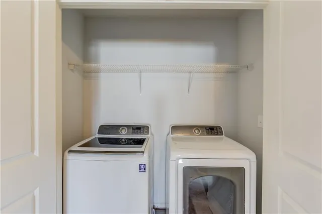 a utility room with dryer and washer
