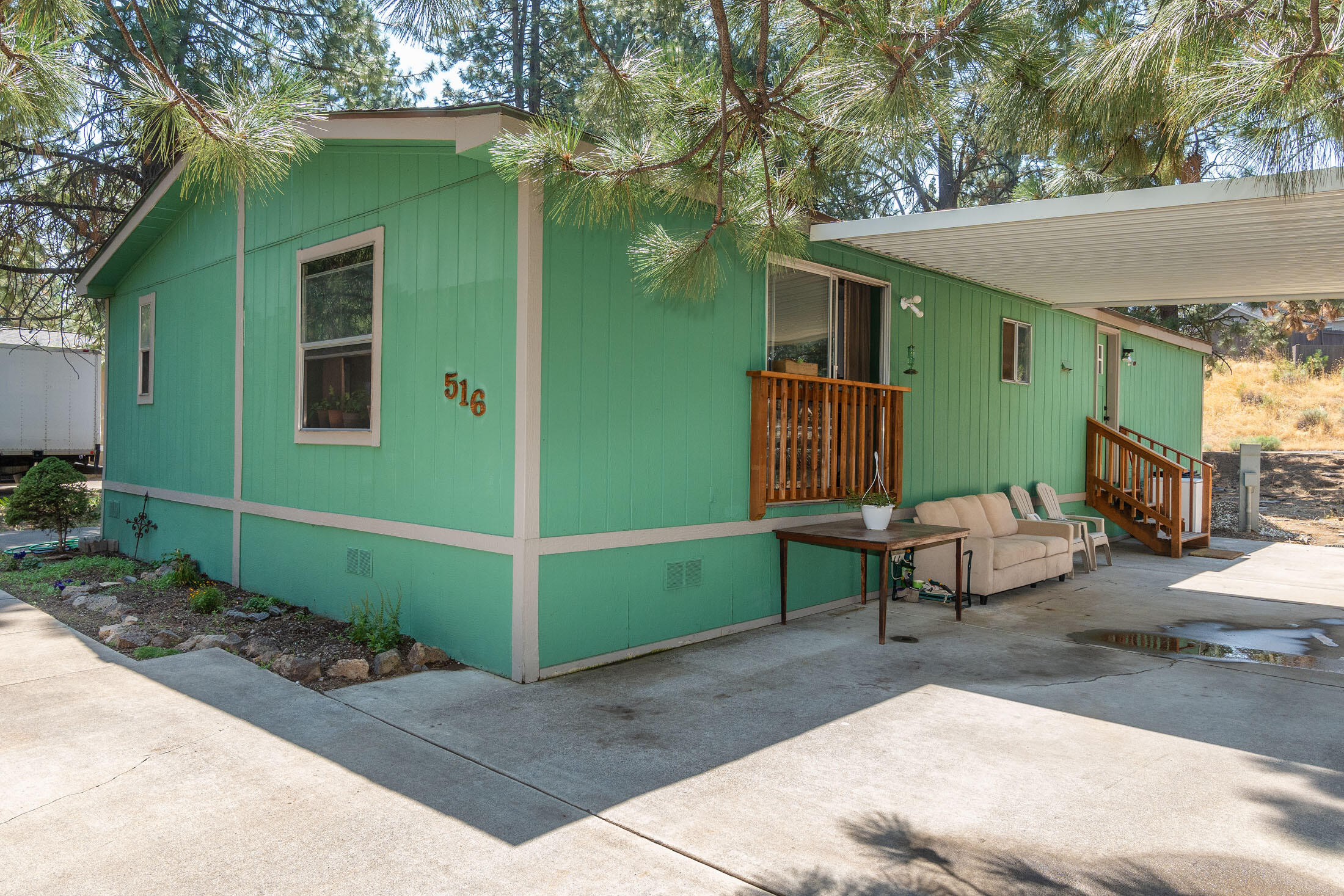 61000 Brosterhous Road, Unit 516 Bend, OR 97702 - Photo 5 of 31 covered back entry that leads to laundry/mud room