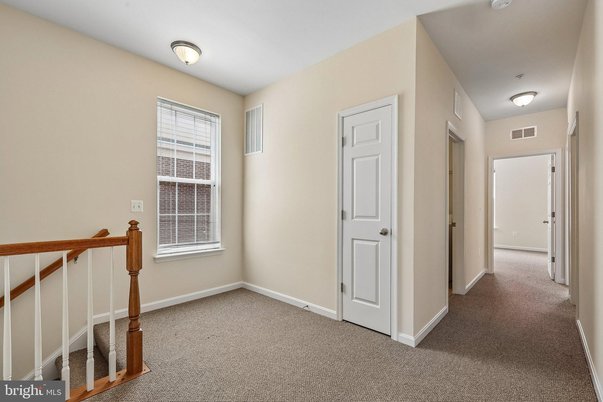9581 Center Street Manassas, VA 20110 - Photo 15 of 25 an empty room with windows