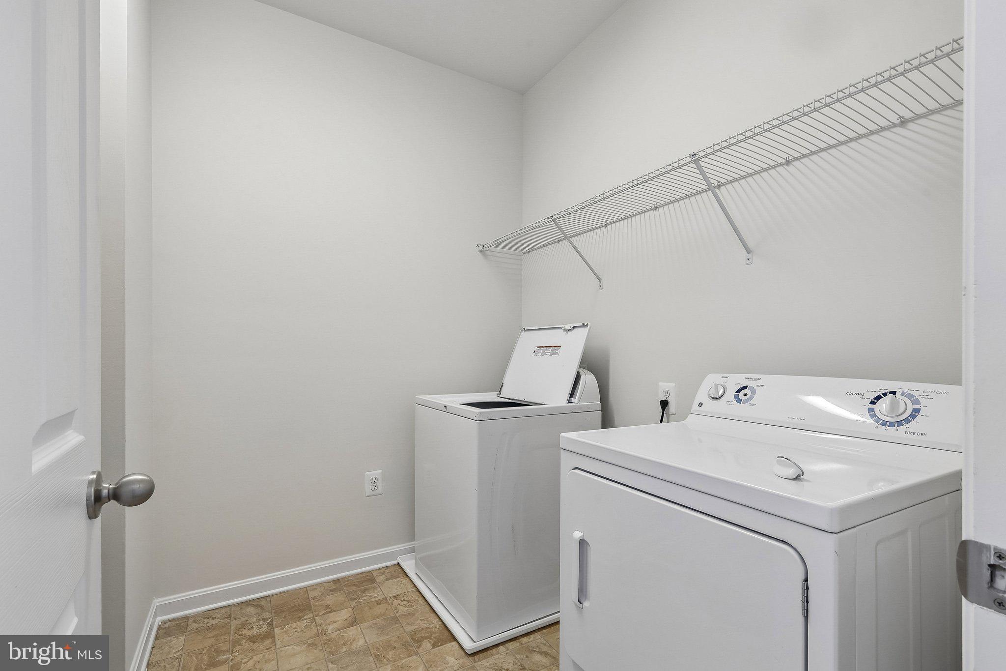 9581 Center Street Manassas, VA 20110 - Photo 24 of 25 a utility room with dryer and washer