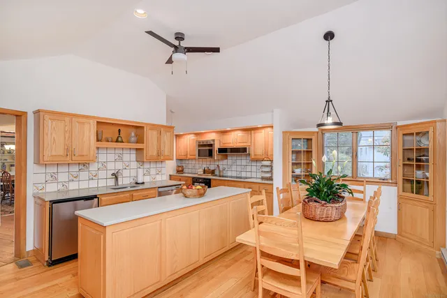 a kitchen that has a cabinets and a stove