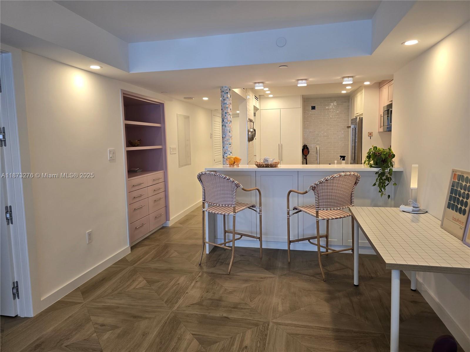 a view of a dining room with furniture
