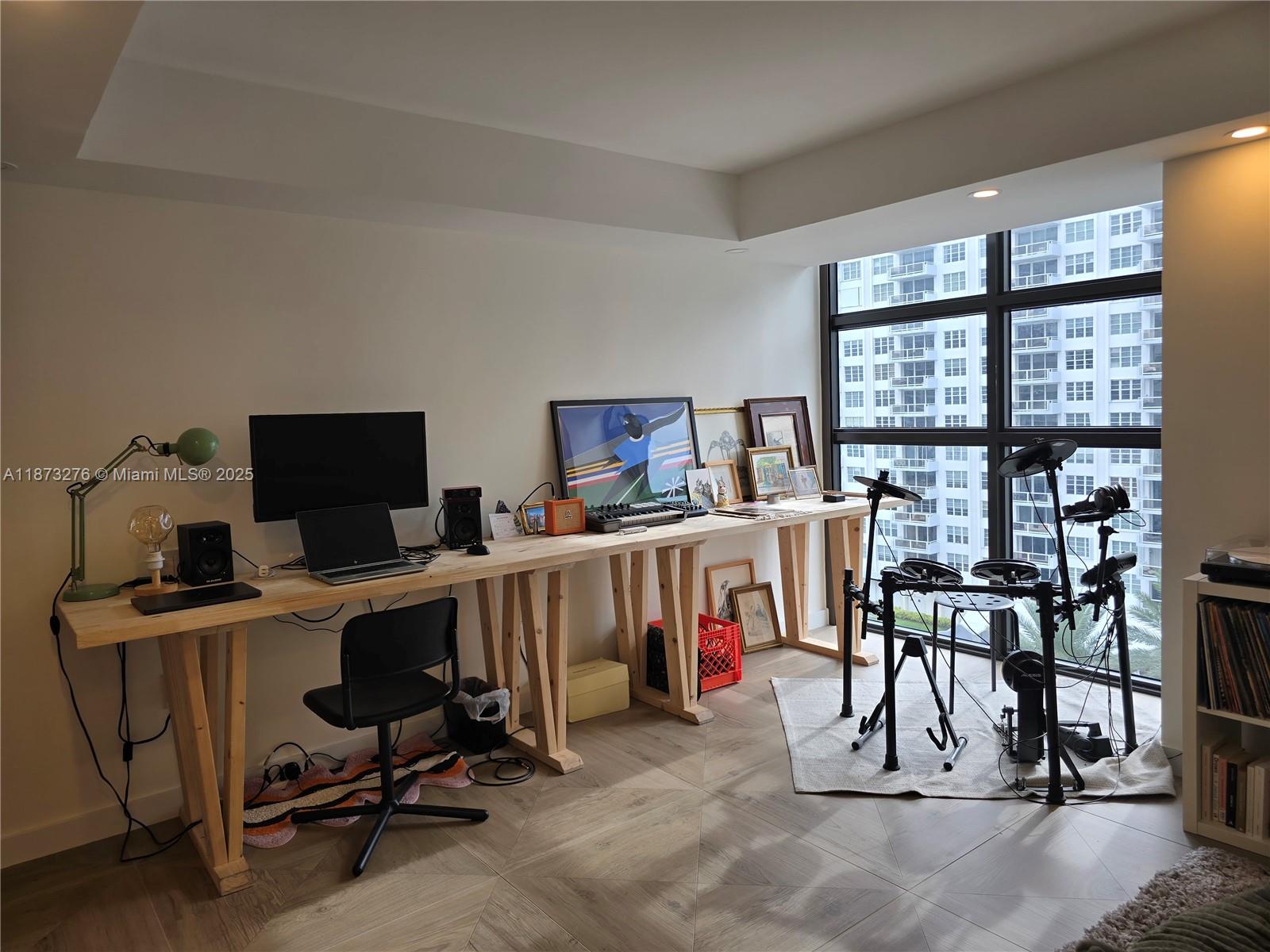 Millionaire's Row Miami Beach, FL 33140 - Photo 26 of 34 a view of a workspace with furniture and a window