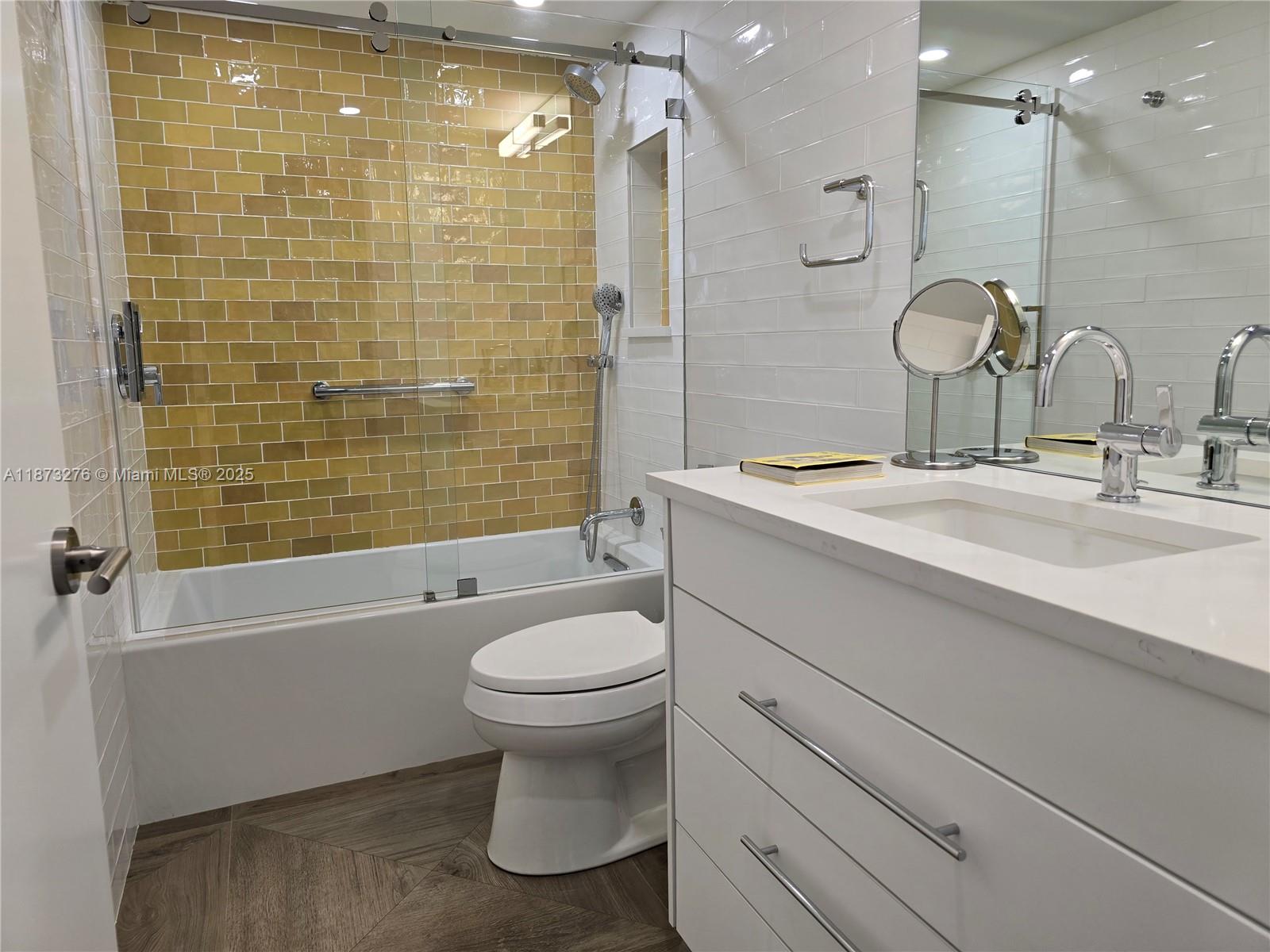 Millionaire's Row Miami Beach, FL 33140 - Photo 27 of 34 a bathroom with a sink a toilet and shower