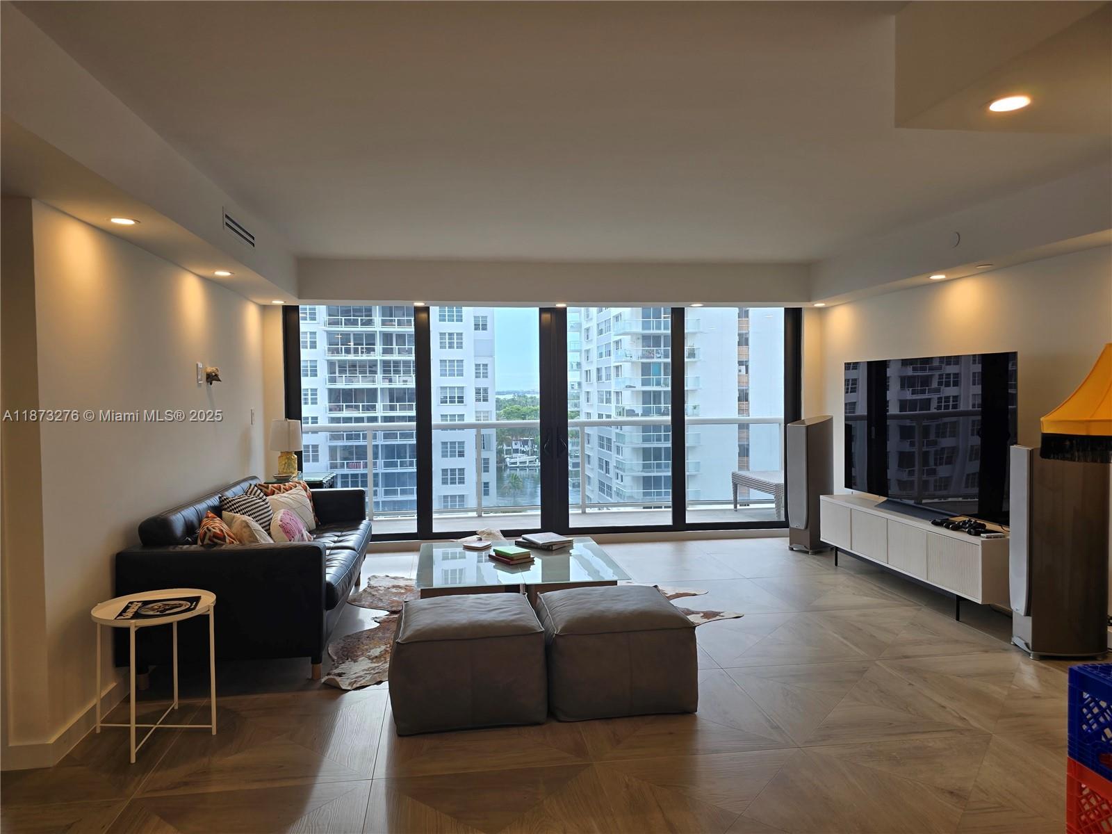 Millionaire's Row Miami Beach, FL 33140 - Photo 4 of 34 a living room with furniture and a large window