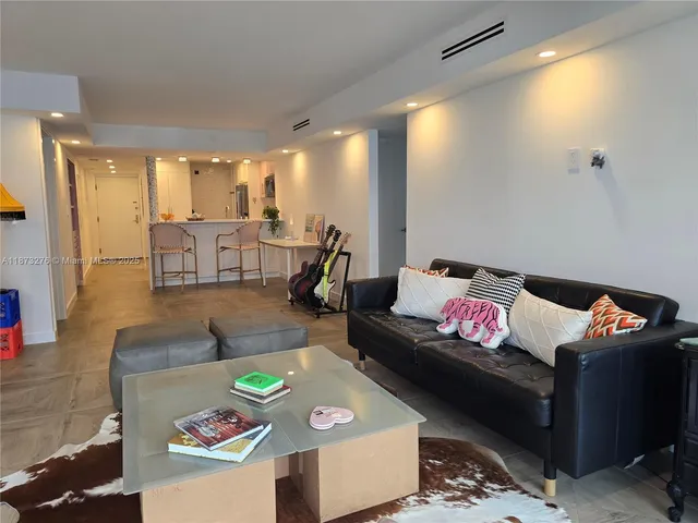 a living room with furniture and a couch