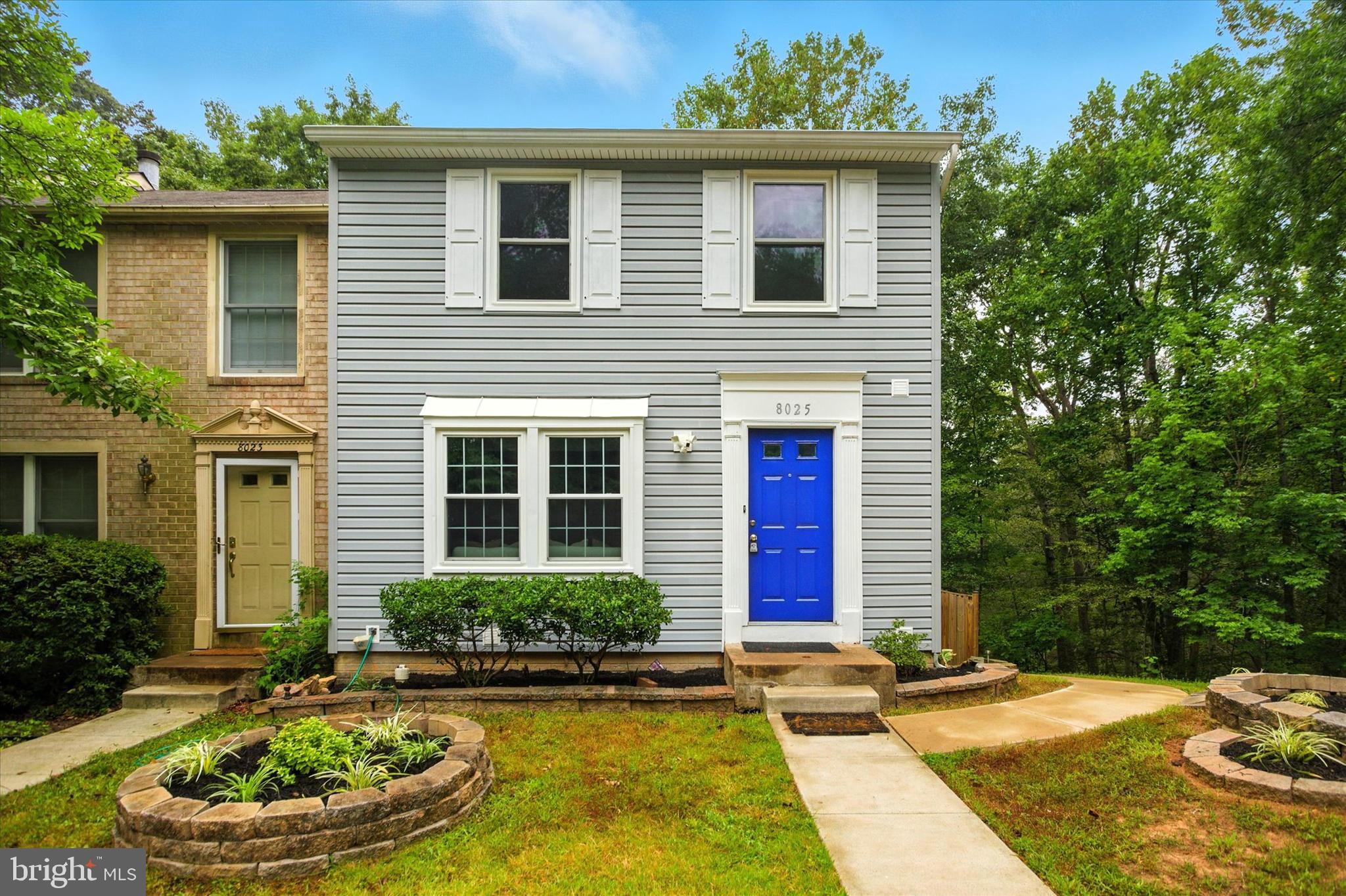 8025 Orange Plank Road Springfield, VA 22153 - Photo 1 of 1 a front view of a house with a yard