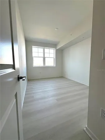 an empty room with windows