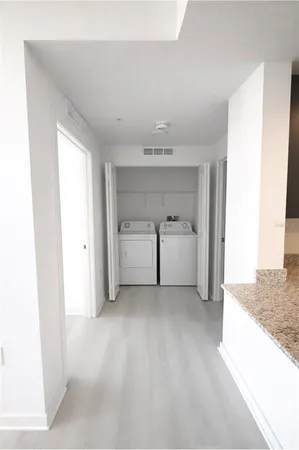 a view of a utility room with a sink