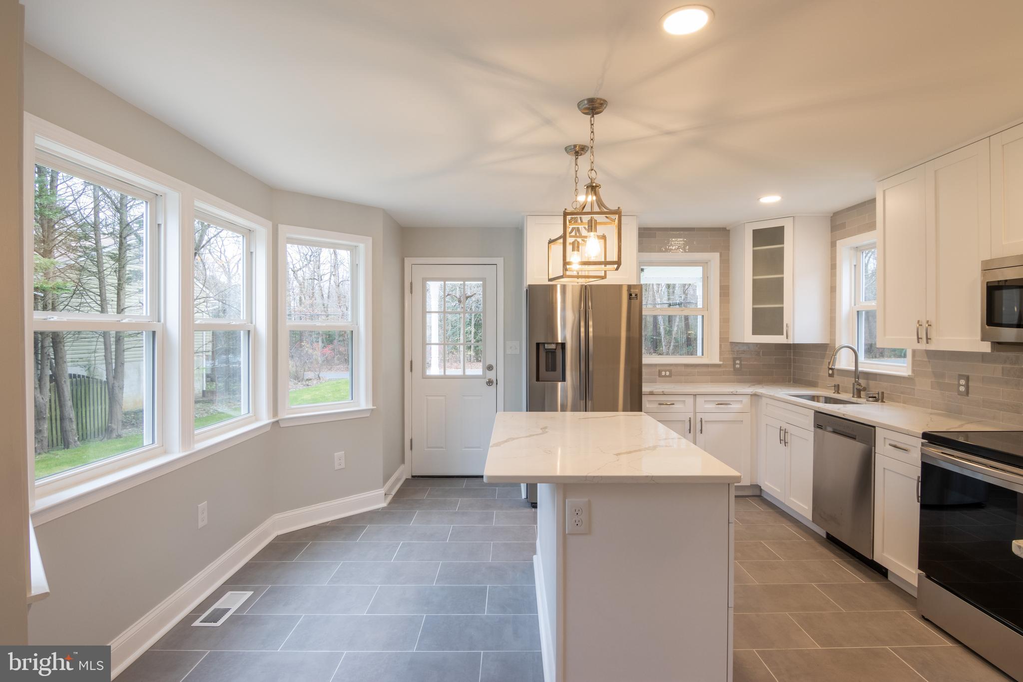791 Danza Road Severn, MD 21144 - Photo 19 of 67 Stunning Kitchen w/ island and breakfast area