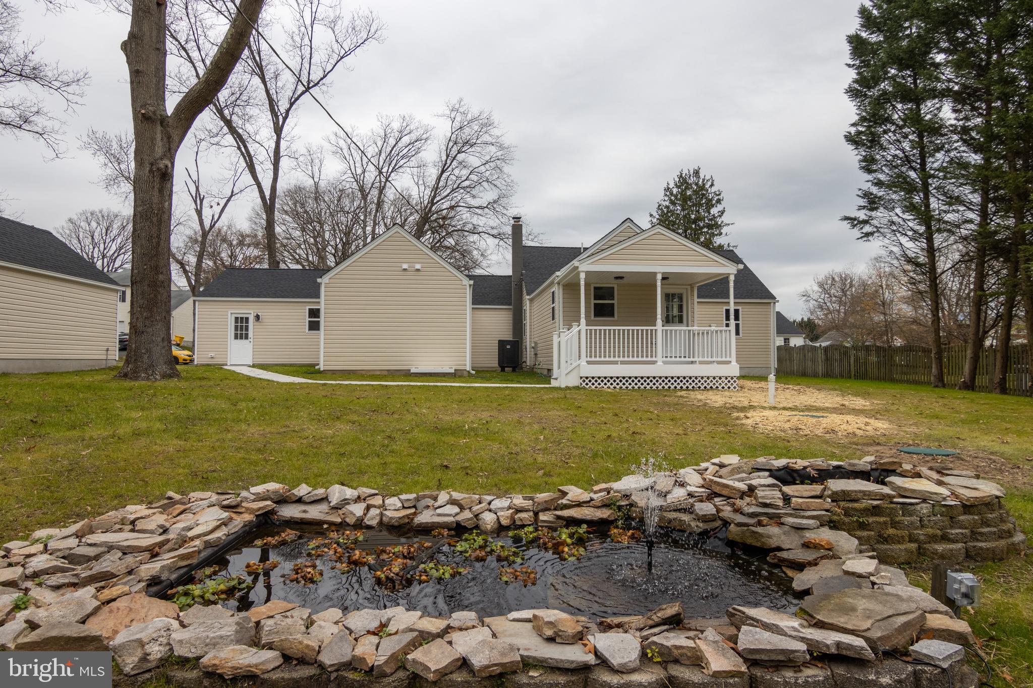 791 Danza Road Severn, MD 21144 - Photo 61 of 67 Pond with all New stone