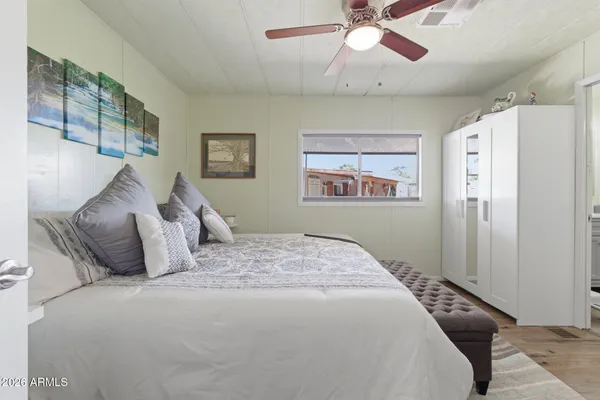 a bathroom with a double vanity sink mirror and