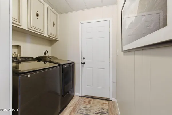 a view of a pathway with a backyard