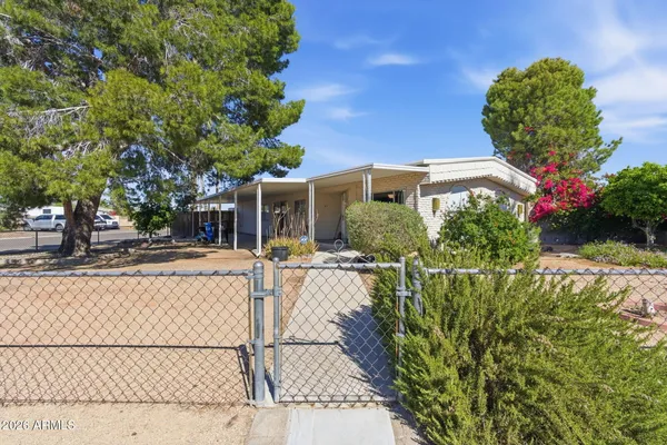 a view of a balcony with chairs