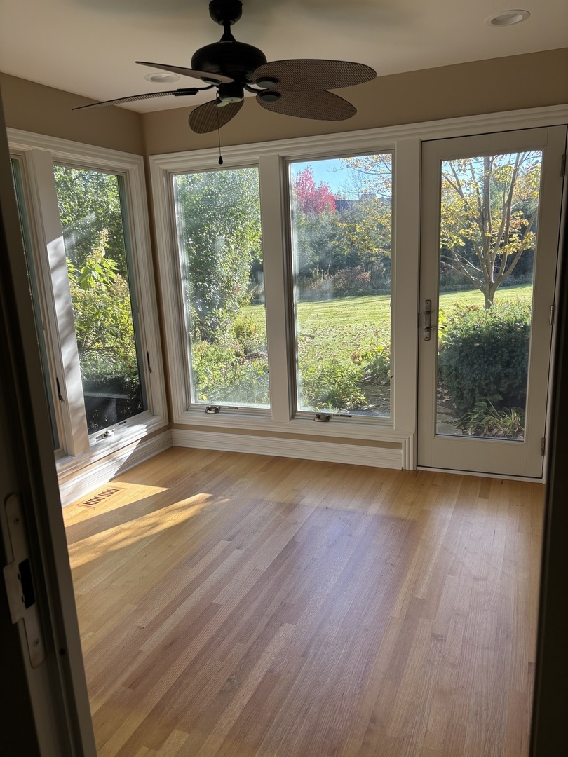 1021 Old Mill Road Lake Forest, IL 60045 - Photo 7 of 13 a view of empty room with wooden floor and fan