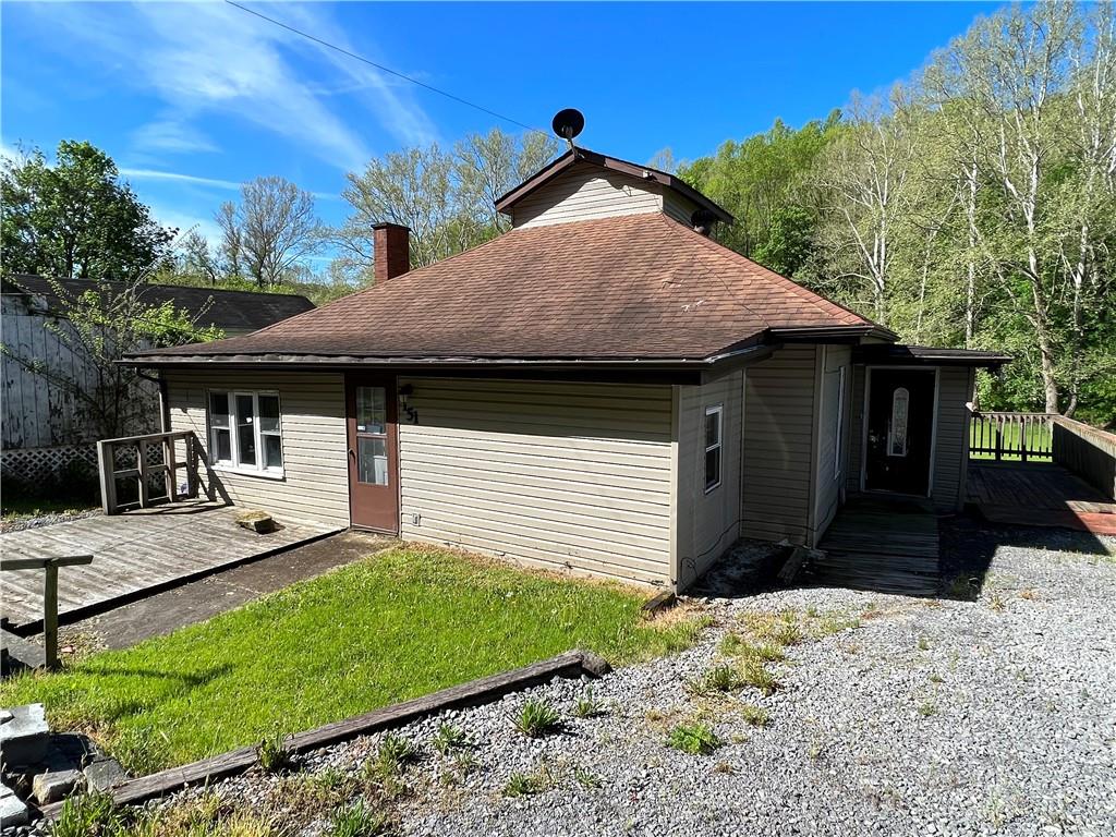 151 Oak Forest Road Brave, PA 15316 - Photo 1 of 16 a front view of a house with a yard