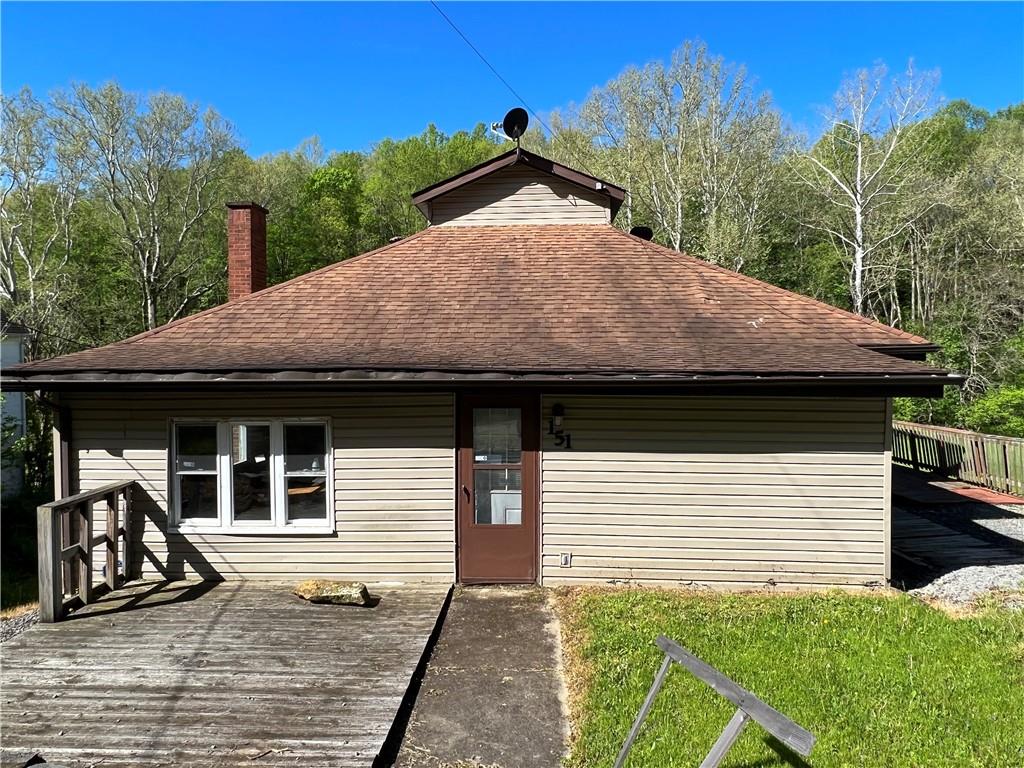 151 Oak Forest Road Brave, PA 15316 - Photo 15 of 16 a front view of a house with garden