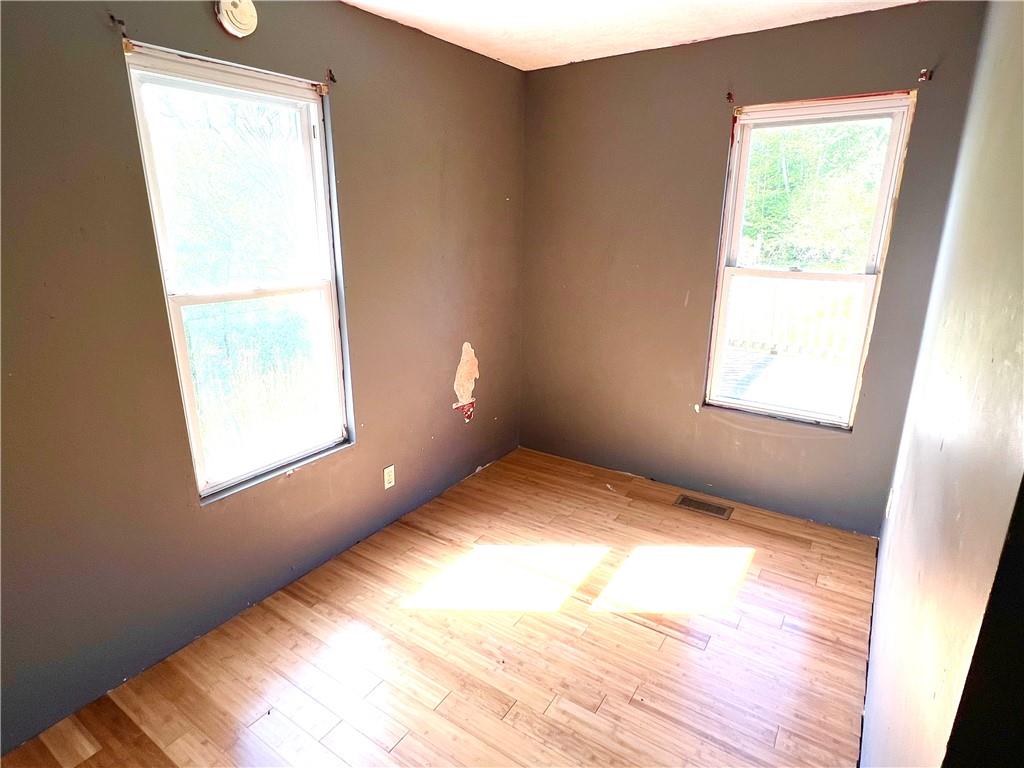 151 Oak Forest Road Brave, PA 15316 - Photo 6 of 16 a view of an empty room and window