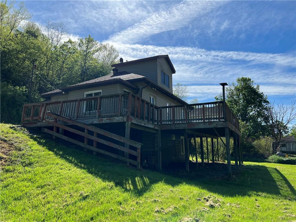 151 Oak Forest Road Brave, PA 15316 - Photo 10 of 16 a view of a house with wooden deck front of house