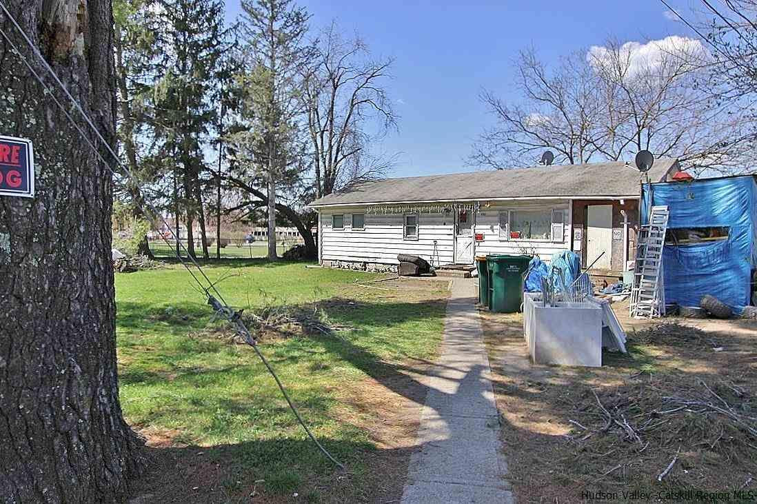 779 Neighborhood Road Lake Katrine, NY 12449 - Photo 1 of 26 a front view of a house with a yard