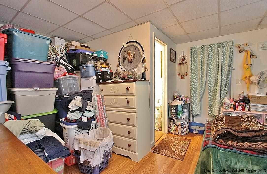 779 Neighborhood Road Lake Katrine, NY 12449 - Photo 12 of 26 a view of a livingroom with furniture and toys