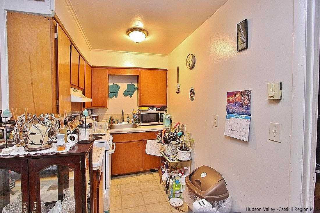 779 Neighborhood Road Lake Katrine, NY 12449 - Photo 17 of 26 a very nice looking dining room with a large window and chairs