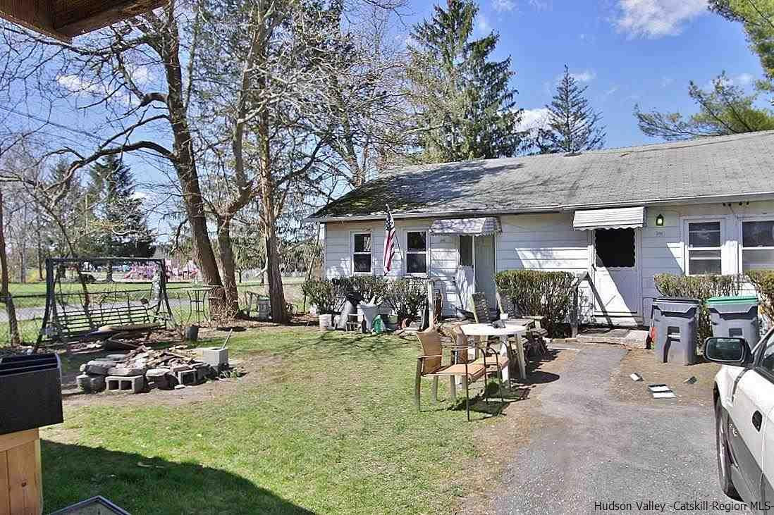 779 Neighborhood Road Lake Katrine, NY 12449 - Photo 19 of 26 a view of a house with backyard porch and sitting area
