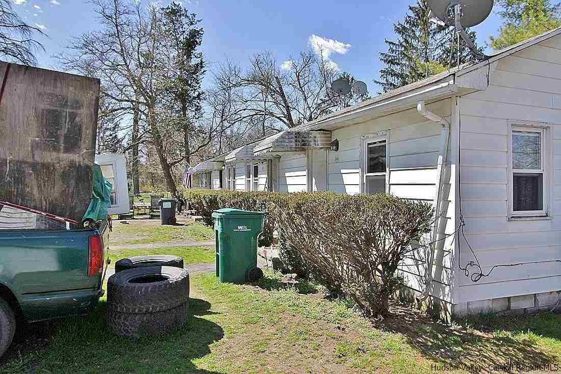 779 Neighborhood Road Lake Katrine, NY 12449 - Photo 22 of 26 a view of a house with a back yard