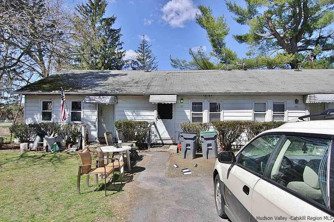 779 Neighborhood Road Lake Katrine, NY 12449 - Photo 25 of 26 a view of a house with backyard porch and sitting area