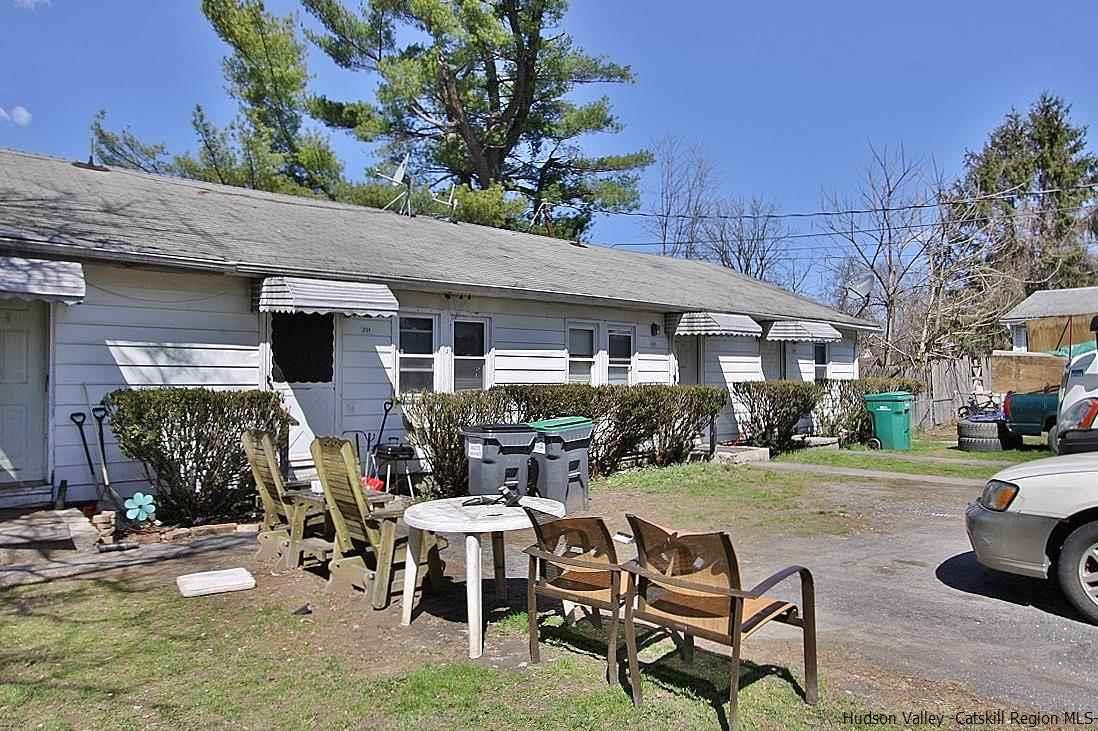779 Neighborhood Road Lake Katrine, NY 12449 - Photo 26 of 26 a view of a house with backyard sitting area and garden