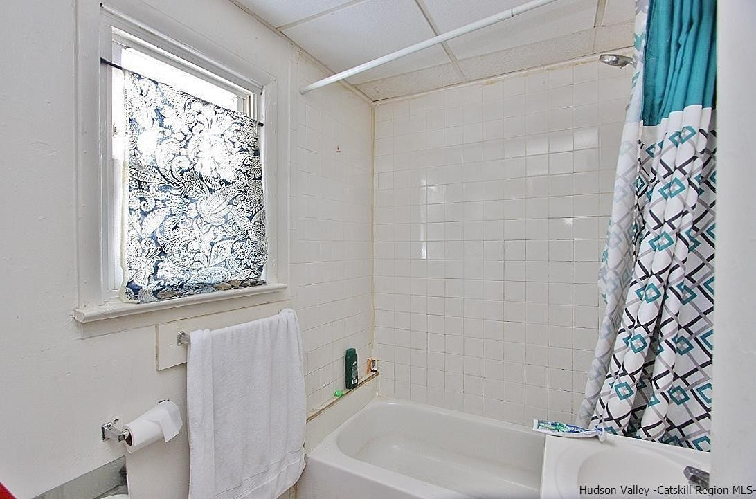 779 Neighborhood Road Lake Katrine, NY 12449 - Photo 3 of 26 a bathroom with a bathtub and shower
