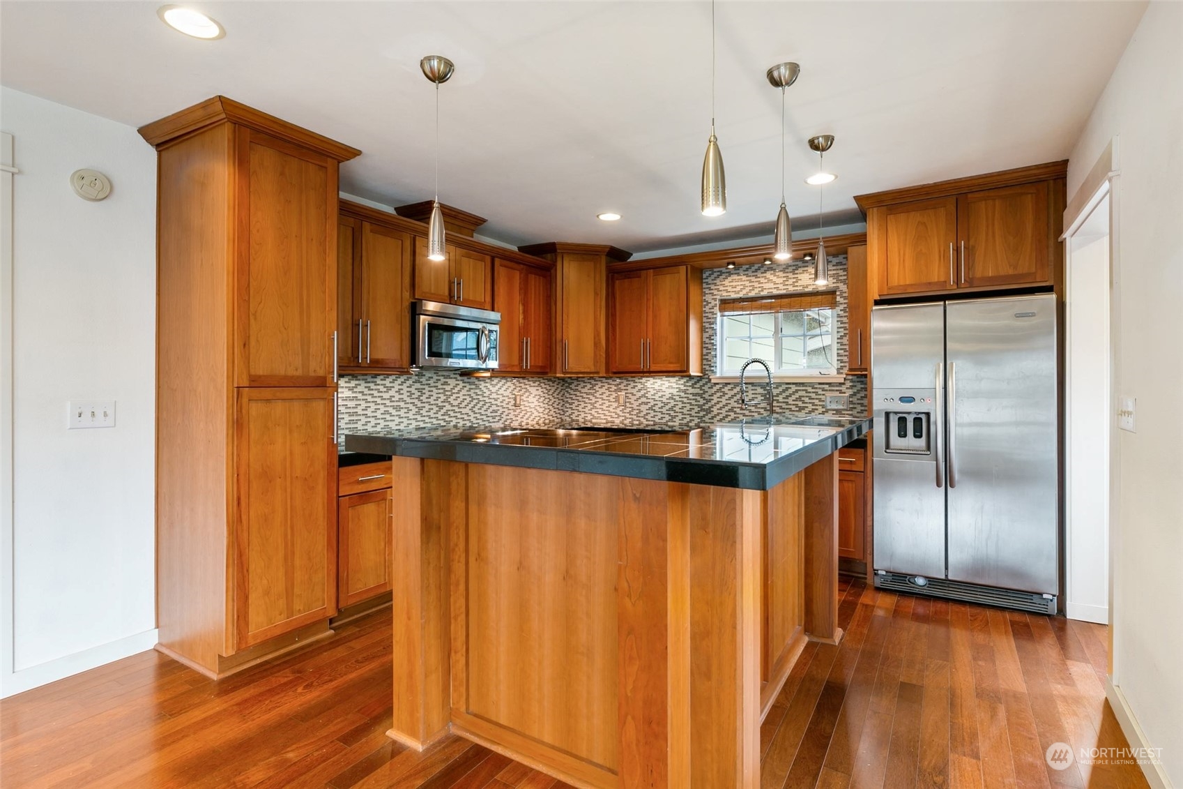 708 North 5th Street Renton, WA 98057 - Photo 4 of 29 a kitchen with stainless steel appliances granite countertop a refrigerator a sink and a cabinets