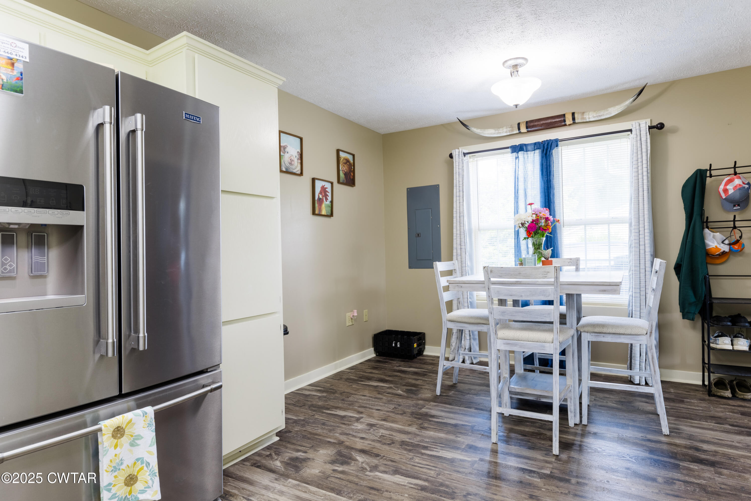 47 Peace Chapel Road Scotts Hill, TN 38374 - Photo 6 of 28 a dining room with furniture and window