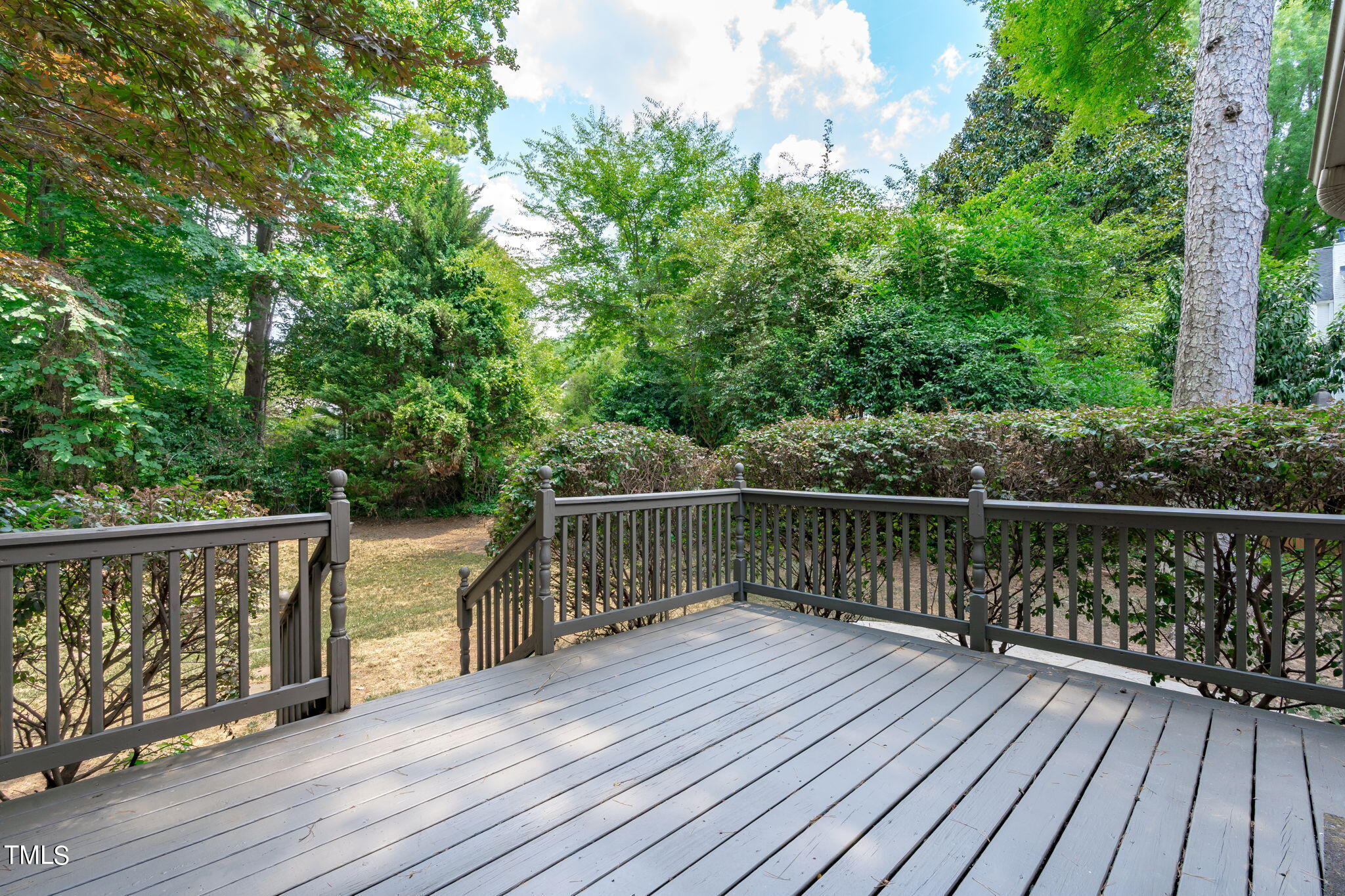 2006 McCarthy Street Raleigh, NC 27608 - Photo 32 of 40 a view of balcony with wooden floor and fence