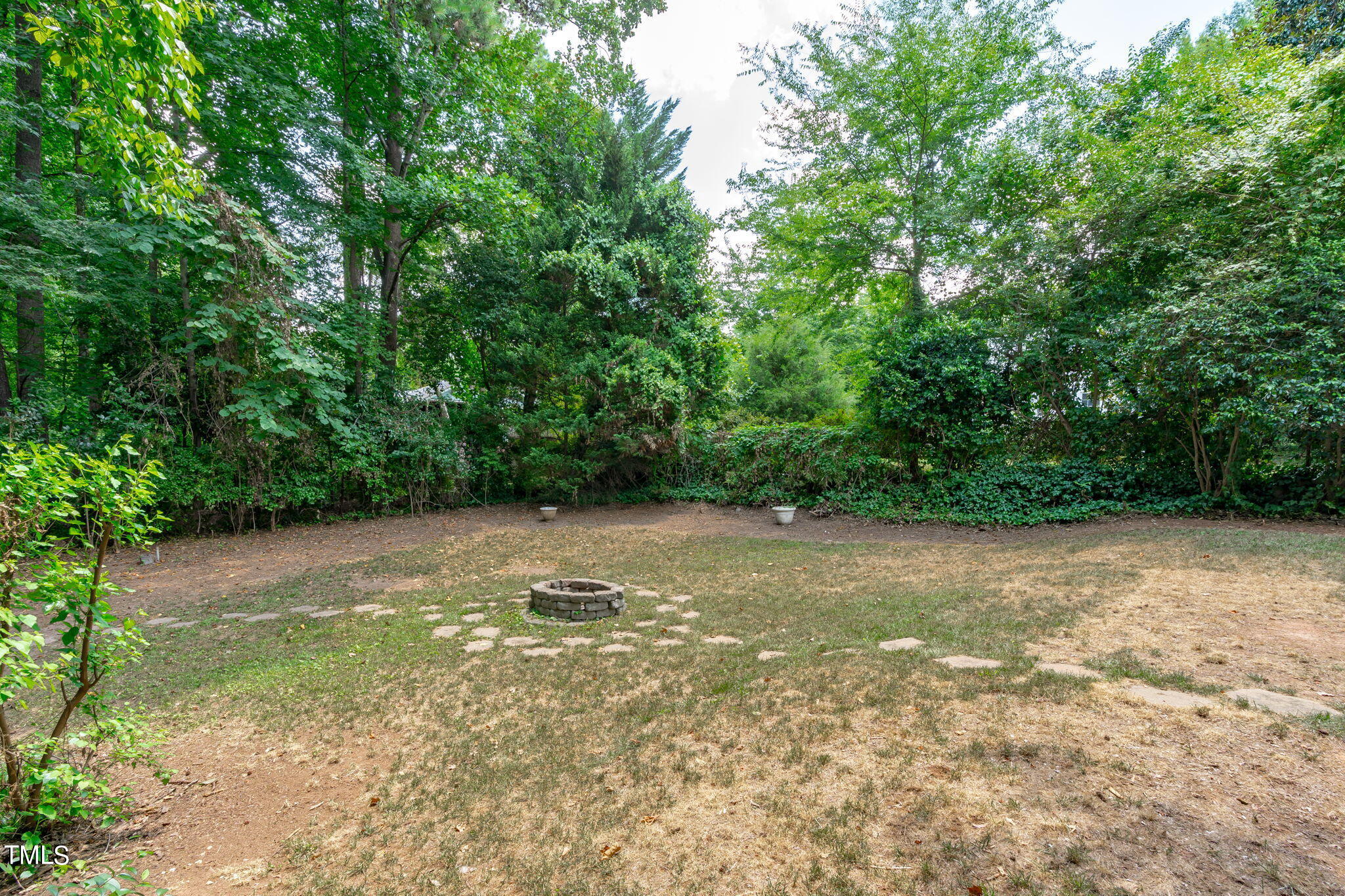 2006 McCarthy Street Raleigh, NC 27608 - Photo 33 of 40 a view of a yard with a tree