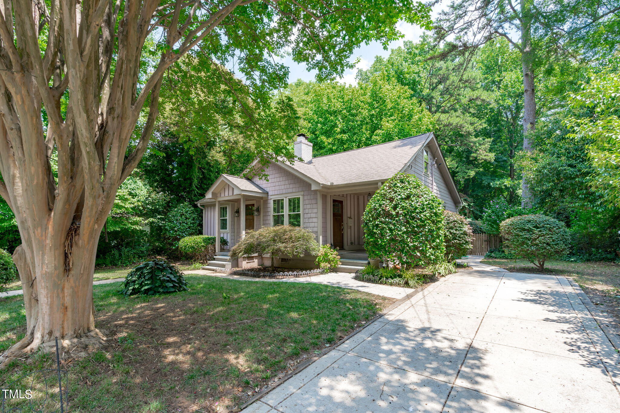 2006 McCarthy Street Raleigh, NC 27608 - Photo 38 of 40 a front view of a house with a yard