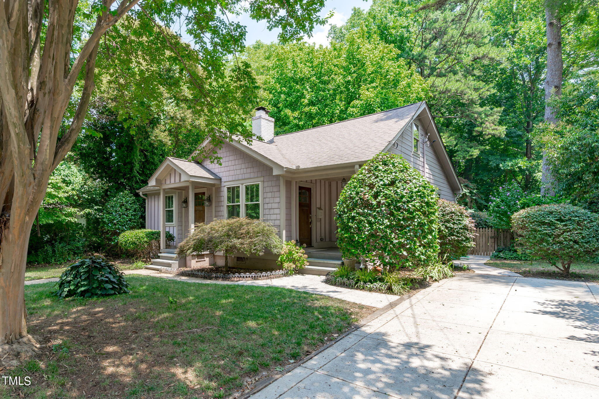 2006 McCarthy Street Raleigh, NC 27608 - Photo 39 of 40 a front view of a house with garden