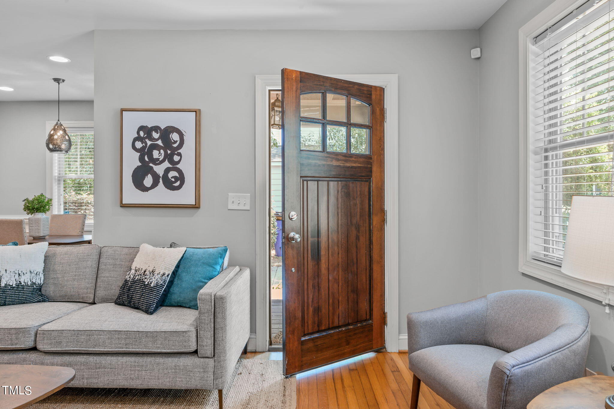 2006 McCarthy Street Raleigh, NC 27608 - Photo 5 of 40 a living room with furniture and a window